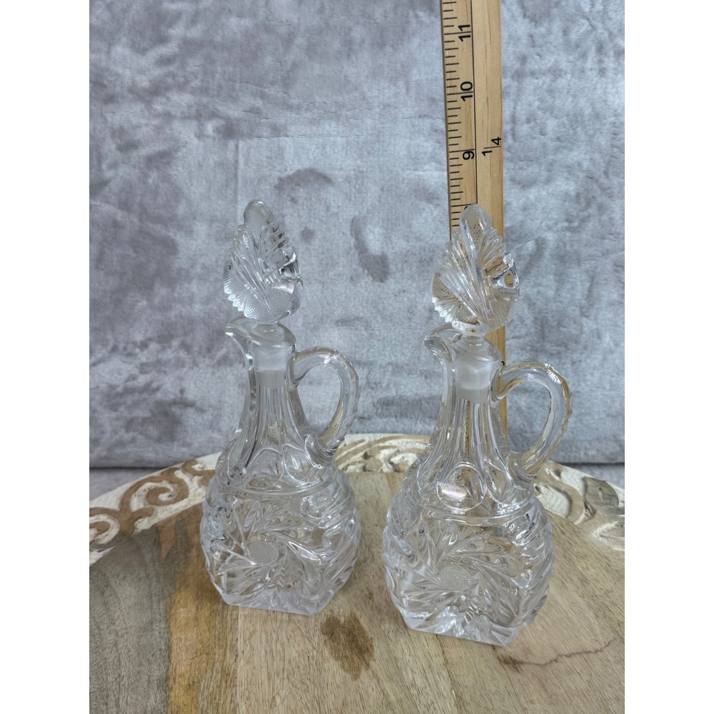 Vintage Clear Pressed Glass Cruet Set Pinwheel Pattern Leaf Stoppers Pair 8.5in
